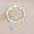 Handmade ceramic beaded bracelet featuring cute pastel fish and star shapes for women - Galaxy Bay Style (1772-05) / Light Blue