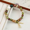 Handmade vintage style ceramic beaded bracelet featuring wooden spacers and a tassel knot - Dust-Crossing Bead (1829-01) / Olive Green