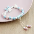 Handcrafted ceramic beaded bracelet with cute pastel charms for women and students. - Cute Puffs (1827-01) / Blue