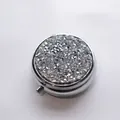 Portable round metal travel pill box featuring a sparkling rhinestone lid and interior mirror - Silver - White Zirconia