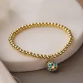 Elegantes vergoldetes Perlenarmband mit blauem Emaille-Anhänger Böser Blick für Damen - Dunkelblau (31624)
