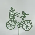 Green metal bicycle garden stake silhouette with bird and flower basket decoration - Vintage Bicycle Shape