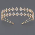 Elegante cerchietto doppio dorato con foglie di zirconia cubica scintillanti da donna. - Cerchietto con Zirconi per Atmosfera Fotografica (TS-J3432G)