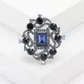 Elegante spilla vintage argentata con cristallo blu reale e strass neri brillanti - Argento Antico - Blu Chiaro
