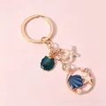 Exquisite ocean themed seashell and starfish keychain with pearls in a gold finish - Dark Blue Green Shell White Starfish Artificial Pearl (H5112)