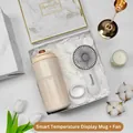 Elegant gift set featuring a smart temperature display thermos cup and a white mini handheld fan - Intelligent Temp Display Cup + Handheld Fan Set (BP-22) / White