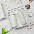 Premium corporate gift set featuring white insulated coffee mug and grey foldable umbrella - Coffee Cup + Umbrella Set (BP-26) / White