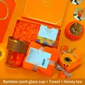 Elegant orange gift set featuring amber glass cup, plush towel and premium honey tea - Bamboo Cup + Towel + Tea Set (LP-15) / Orange