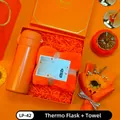 Premium orange corporate gift set including an insulated thermos and a soft towel - Vacuum Flask + Towel Set (LP-42) / Orange