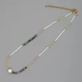 Elegant bohemian beaded necklace featuring white tubes and a single baroque pearl accent - Baroque Pearl Style (MI-N220003C)