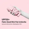 Kompakter rosa fünf-fach Mini-Regenschirm mit UPF50 plus Schutz für Sonne und Regen - Flach / Nebelrosa