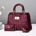 Elegant quilted burgundy handbag set including a matching small pouch and shoulder strap - Burgundy