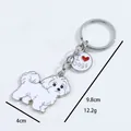 Close-up of white Maltese cartoon dog keychain showing 4cm and 9.8cm dimensions - New Maltese