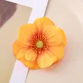 Close-up view of a vibrant yellow artificial magnolia flower head for home decor - Small / Orange