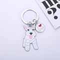 Detail view of the zinc alloy cartoon schnauzer dog keychain with I Love Dogs charm - Glossy White Schnauzer