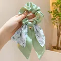 Elegant light green floral bow scrunchie with long ribbon tails for women's hair styling - Grass Green Floral Bow Style / Grass Green