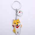 Detailed view of Shiba Inu dog keychain with an I Love Dogs metal charm pendant. - Cartoon Akita