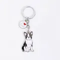 Close-up detail of a French Bulldog metal keychain with a cute "I Love Dogs" charm. - Pink Ear Bulldog