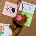 Quirky brown plush doll charm with pink nose and black trunks, unique bag accessory - 15CM / Brown Madman with Strap