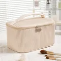 Elegant creamy beige pleated PU leather makeup bag with double zippers and handle - Cylinder Style Creamy White