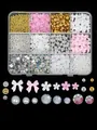 Detailed view of 12-grid mixed nail art charms with pearls, bows, and flowers - Gold and Silver Round Beads Flower Bow Set (ZB130-3)