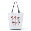 Detailed view of white canvas tote bag featuring six cute cartoon nurse illustrations. - White Cartoon Nurse Series Style (hl1541)