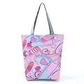 Detailed close-up view of creative cartoon nurse print on a pink women's beach tote bag - Pink Cartoon Medical Print Style (hl1542)