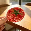 Detail of tomato-shaped acetate hair claw clip with sparkling red rhinestones - Tomato