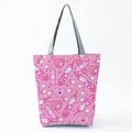 Detailed view of pink tote bag featuring cute nurse and medical themed prints - Pink Cartoon Medical Elements Style (hl1545)