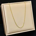 Elegant gold titanium steel O-chain necklace on a jewelry display - O Chain / 40+5cm / Gold