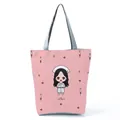 Detail view of pink tote bag featuring a cute cartoon nurse print and gray straps - Pink Cartoon Nurse Figure Style (hl1547)