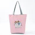 Close-up of the cute cartoon nurse illustration printed on a pink shoulder tote bag - Light Pink Cartoon Nurse Print Style (hl1549)
