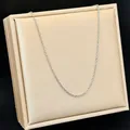 Silver-toned titanium steel O-chain necklace on jewelry display - O Chain / 40+5cm / Silver