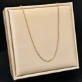 Rose gold titanium steel O-ring lip chain necklace displayed on a beige jewelry stand - O Chain / 40+5cm / Rose Gold