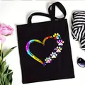 Black canvas tote bag featuring a colorful rainbow heart and paw print design. - Rainbow Heart & Paw Style (No. 13) / 35x40cm