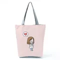 Canvas tote bag in pink featuring a cute cartoon nurse illustration and grey straps. - Light Pink Chibi Nurse Illustration Style (hl1556)