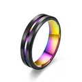 Close-up of black brushed stainless steel ring with vibrant rainbow inner plating. - 6mm Colorful Beveled Edge