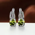 Elegant olive green oval gemstone earrings with silver plating for women's jewelry. - Platinum Olive Green