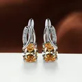Elegant champagne oval cubic zirconia silver-plated hoop earrings for women's fashion - Rhodium Plated Champagne