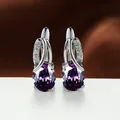 Elegant silver-toned earrings with oval purple gemstones and sparkling zircons - Platinum Plated Purple Zirconia