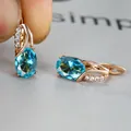 Champagne gold oval earrings with light blue water stones and clear crystal accents - Champagne Gold Light Blue