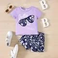 Sommerliches Outfit für Mädchen: lila T-Shirt und geblümte Shorts im 2-teiligen Set - 90 / Oberteil Und Unterteil / Lavendel