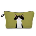Detailed view of an olive green cosmetic bag featuring a cute cartoon tuxedo cat illustration. - Olive Green B&W Cat Style (hz3548)