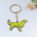 Close-up view of a cute golden retriever metal keychain with vibrant lime green enamel - Fluorescent Green Golden Retriever Style
