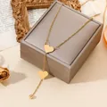 Elegant 18k gold plated stainless steel double heart lariat necklace on a jewelry box - Double Heart Shape Style (Model 20260130-20)