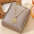 Elegant 18k gold plated stainless steel initial letter M pendant necklace on jewelry box - Letter M Rhinestone Style (20260130 Style 21)