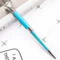 Eleganter kugelstifte in Tiffany-Blau mit großem Diamantaufsatz und glitzerndem Lauf. - Hellblau