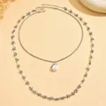Collana a strati vintage color argento con catena a fiori e ciondolo liscio ovale - Argento (X3487)