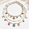Set di collane a strati vintage con ciondoli in pietra colorata e fiori - Oro (X3490)