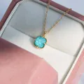 Close-up of a 925 sterling silver square turquoise crystal necklace in a gift box - 925 Silver / Dark Necklace